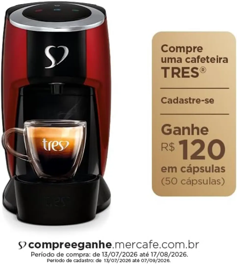 Mão inserindo cápsula na Cafeteira 3 Corações TRES Touch Vermelha, em ambiente de cozinha.